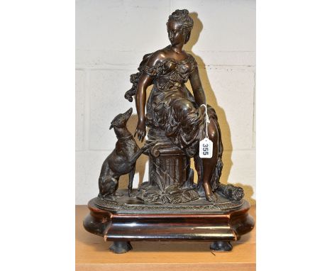 A SPELTER FIGURE OF DIANA, in Classical dress, seated on a column, with a hunting dog and a sheath of arrows, supported on a 