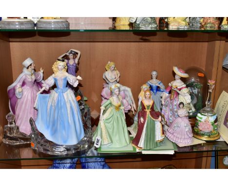 A GROUP OF FIGURINES, comprising a Franklin Mint 'Cinderella's Enchanted Moment' bell shaped snow globe, with certificate (ri