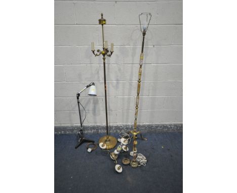 AN ONYX AND BRASS STANDARD LAMP, a similar table lamp, along with a brass standard lamp, a triple branch ceiling light, and a