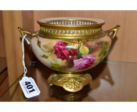 A ROYAL WORCESTER TWIN HANDLED POT POURRI BOWL, painted with roses and signed J Flexman (John), having a pierced gilt rim, an