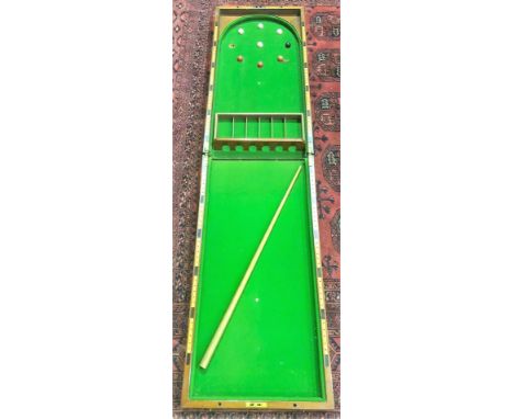 A Victorian mahogany bagatelle folding tabletop game.