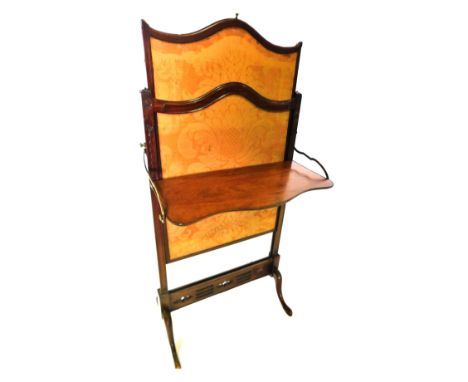 A late 19thC mahogany adjustable fire screen, with gold Damask insert, the ratchet mechanism for extending upwards, and a hin