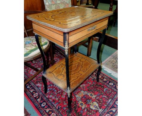 A 20th century marquetry ladies dressing table, having hinged lid with mirror fitted inside, fitted inner compartments, lower