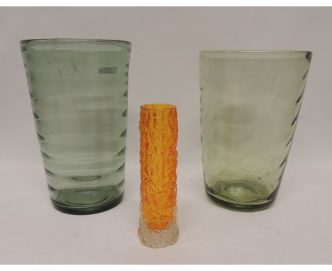 A small Whitefriars orange bark glass vase, 14.5cms high together with two tall green glass vases, 19.5cms and 21cms high (3)