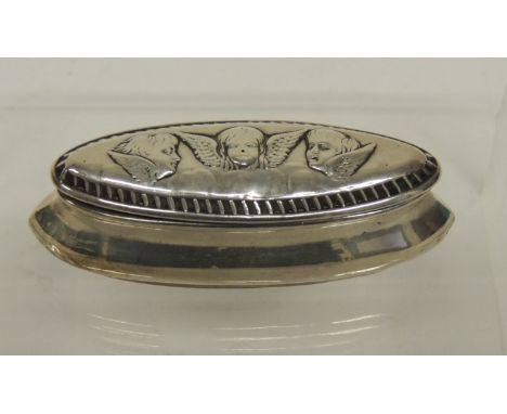 A small Victorian silver snuff box of navette shape, the hinged lid embossed with angel masks, Birmingham 1899,  6.5cms long