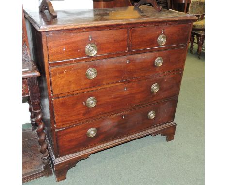 A 19th century chest of two short and three long graduated drawers on bracket supports, 95cm high, 94cm wide. 