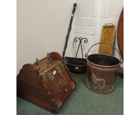 A Victorian brass bound coal box (lacks liner); a decorative copper coal bucket with embossed decoration; an African walking 