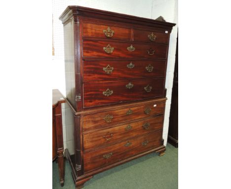 A 19th century mahogany veneer on oak carcass chest on chest, having moulded pediment, reeded pillasters to each side and wit