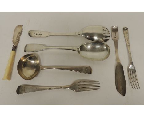 A William IV silver serving spoon and fork London 1830; a George III silver old English pattern sauce ladle London 1800 toget