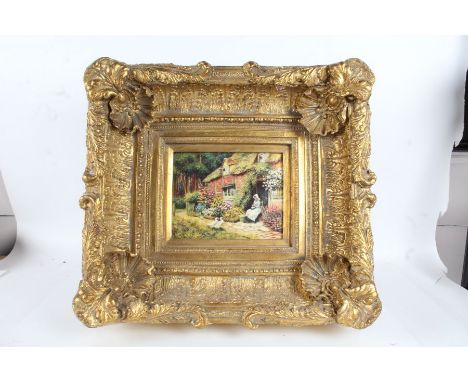 After Helen Allingham, modern oleograph study of a figure seated outside a thatched cottage, housed within a highly ornate gi