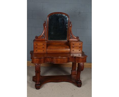 Victorian mahogany duchess dressing table, the swing mirror above an arrangement of six drawers and central compartment, fitt