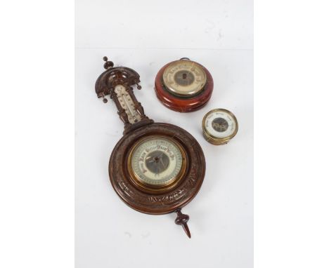 Late Victorian carved barometer, together with a brass barometer and another wooden example (3)