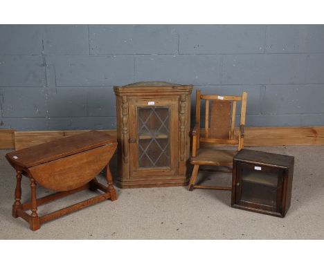 Small oak drop leaf table, together with a pine corner cabinet, a small oak and glazed cabinet and a wooden child's chair (4)