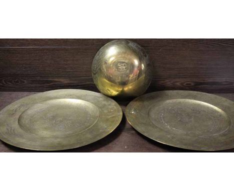 TWO CHINESE BRASS CHARGERS AND A CHINESE BRASS BOWL (3) 
the chargers 36cm diameter, the bowl 20cm diameter 
light surface ma