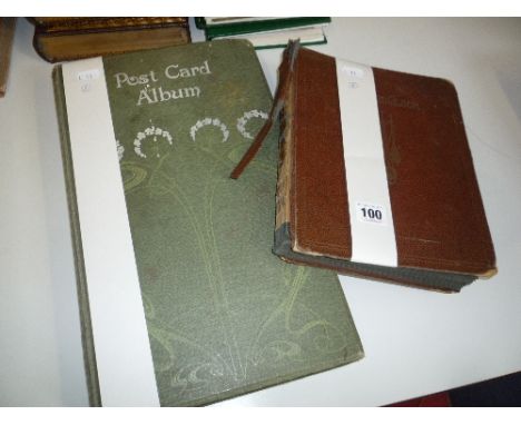 TWO POSTCARD ALBUMS, containing a quantity of early 20th Century British topographical and greetings cards, loosely inserted