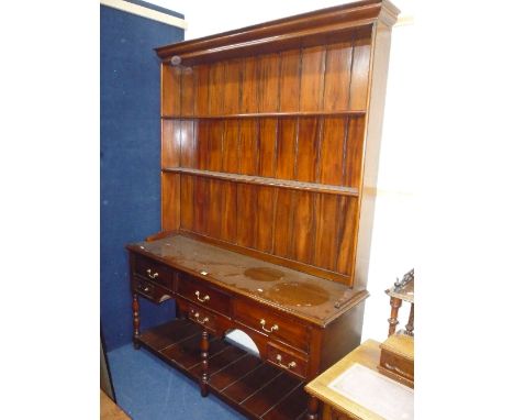 A GEORGIAN STYLE MAHOGANY DRESSER, plate rack above an arrangement of six various sized drawers and lower shelf