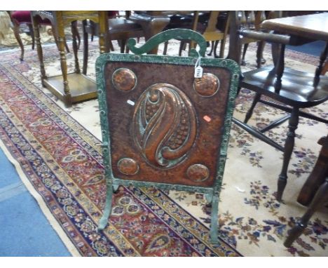 AN ARTS AND CRAFTS STYLE, beaten copper firescreen