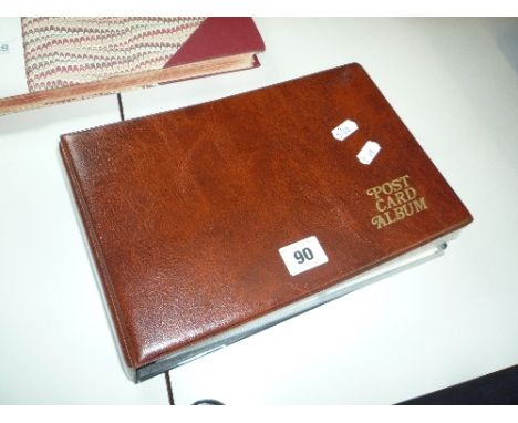 A COLLECTION OF MODERN R.M.S. TITANIC MEMORABILIA, reproduction postcards, phonecards etc, loosely inserted in a postcard alb