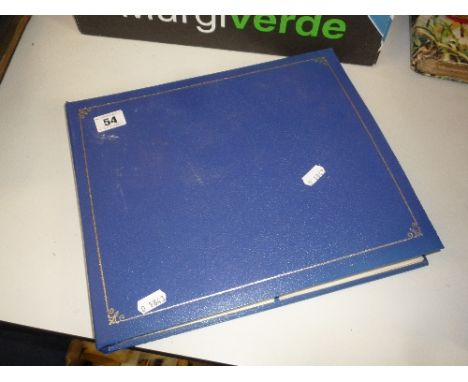 A POSTCARD ALBUM, containing a collection of topographical, people and humerous cards including Mabel Lucie Attwell and Donal