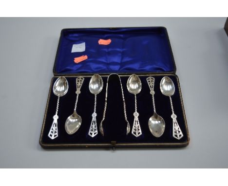 A BOXED SILVER SET OF SIX TEASPOONS, and sugar nips, Birmingham various dates circa 1890, marks for Haseler Brothers