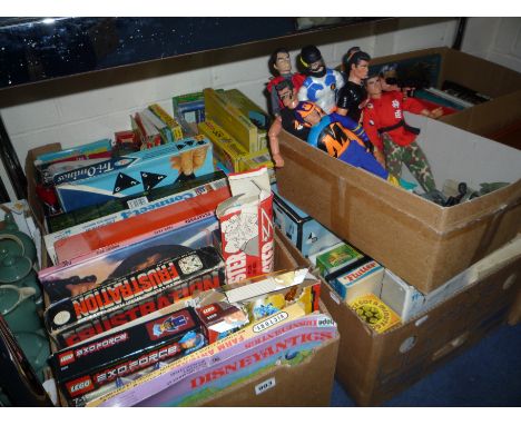 FOUR BOXES OF TOYS, to include boxed games, boxed Lego (contents not checked), unboxed Action Men items etc