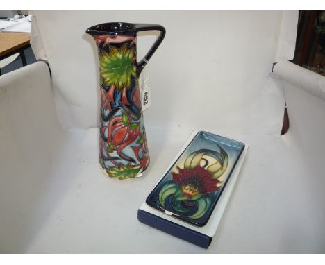 A LIMITED EDITION MOORCROFT POTTERY 'RED RIBBONS' JUG, designed by Shirley Hayes dated 14th June 2004, impressed and painted 