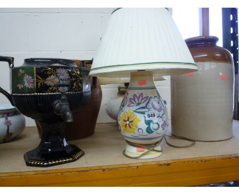 A POOLE POTTERY TABLE LAMP, an urn (s.d.), another lamp and two stoneware jars (5)