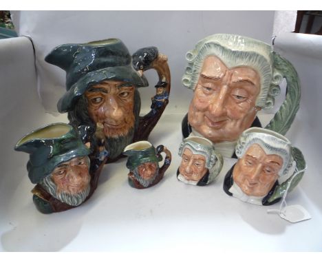 THREE GRADUATING ROYAL DOULTON 'THE LAWYER' CHARACTER JUGS, D6498, D6504 and D6524 and three graduating 'Rip Van Winkle' jugs