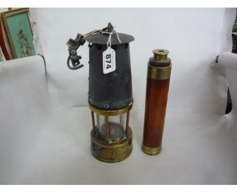 A MINERS LAMP, and a folding hand-held telescope (2)