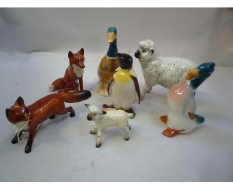 A GROUP OF BESWICK ANIMALS, Fox No.1440 and Fox No.1748, Penguin with walking stick No.803, Mallard Duck No.756/2A, Duck No.9