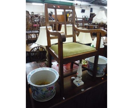 AN OAK FRAMED ARMCHAIR, pair of floral jardinieres with drip trays and a table lamp (4)