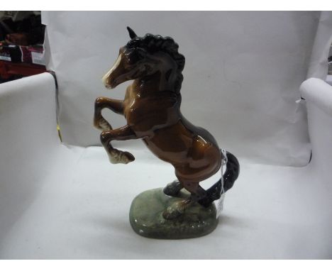 A BESWICK WELSH COB, rearing, No.1014, (first version)