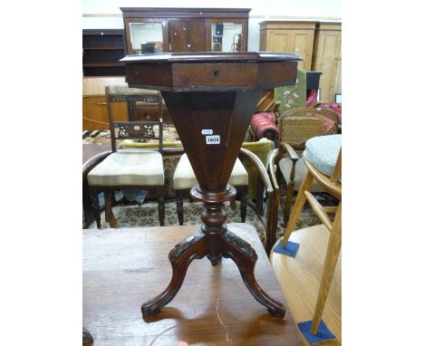 A VICTORIAN MAHOGANY SEWING BOX, on tripod support (s.d.)