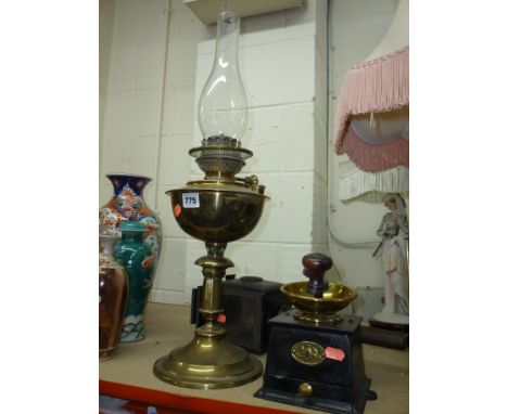 A BRASS OIL LAMP, a coach lamp and a Hill Top Foundry Co. coffee grinder (3)