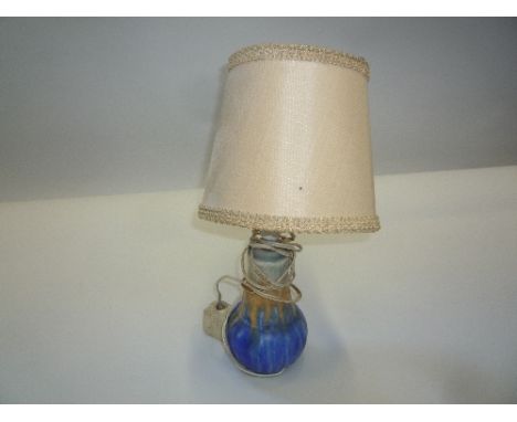 A RUSKIN POTTERY CRYSTALINE LAMP BASE, decorated in blue, orange and green, impressed marks and 1931, height approximately 16