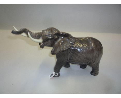 A BESWICK ELEPHANT, trunk stretching, large, No.998