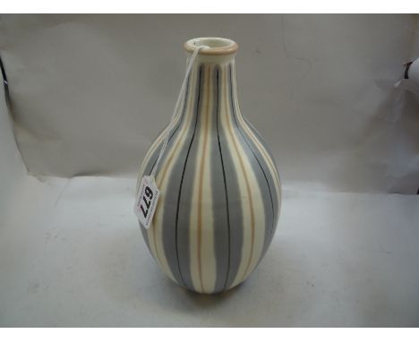 POOLE POTTERY, a free form bottle vase decorated in the YAP pattern with lavender, black and pink stripes, printed and painte