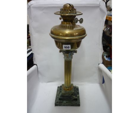 A BRASS FLUTED COLUMN OIL LAMP, (no shade/funnel)
