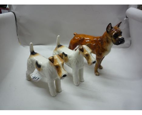 TWO BESWICK WIRED-HAIRED TERRIERS, 'Talavera Romulus' No.963 (one s.d.) and a Goebel Boxer Dog (3)