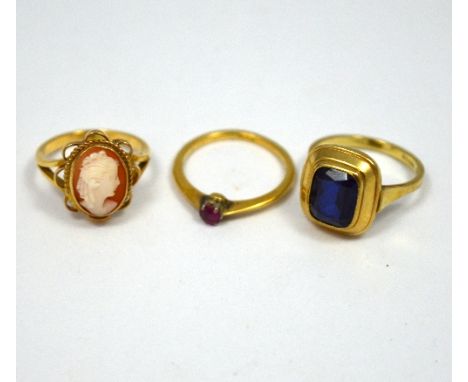 THREE RINGS, to include a cameo ring, a ruby ring and a sapphire ring