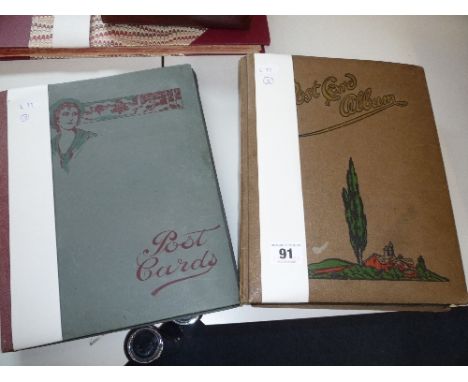 TWO ALBUMS OF POSTCARDS, early 20th Century, British and Foreign topographical, including post WWI views, loosely inserted