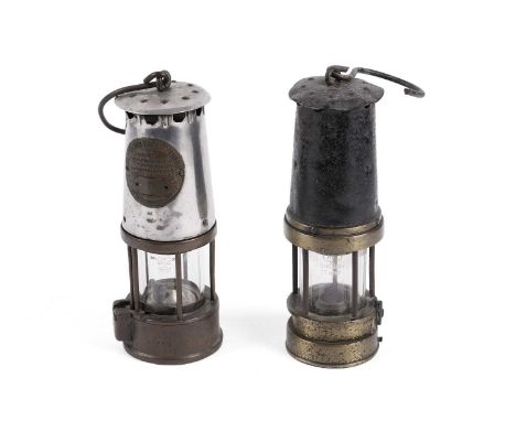 Two early 20th Century miner’s lamps, comprising: a Protector Lamp &amp; Lighting Co Ltd type 6 Eccles miner’s lamp, 24cms hi