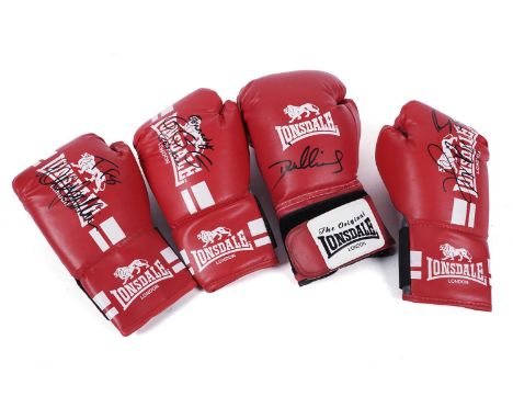 A collection of four autographed boxing gloves, signatures to include: Tyson Fury, Ricky Hatton, Gennady Golovkin, and others