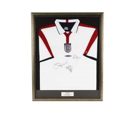 An autographed Umbro England shirt, signatures include: David Beckham, Michael Owen and Wayne Rooney, 79 x 64cms.