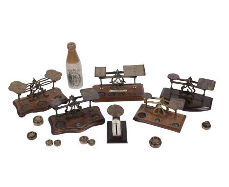 Six sets of early 20th Century postage scales, makers including Criterion and other unbranded, with postage weights; and a Ro
