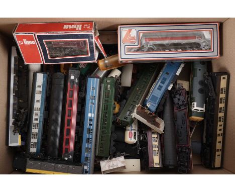 A collection of 00-gauge rolling stock, makers including: Bachmann, Tri-Ang, Lima, Hornby, and other unbranded, approximately