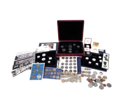 A collection of British coinage, Victorian and later, including: three gold plated commemorative coins; a cased set of United