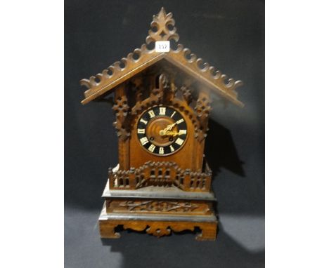     An Early 20thc Black Forest Type Mantel Clock With Cuckoo Movement              