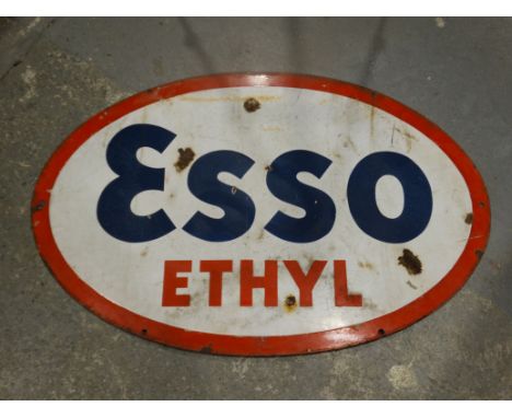 A Large Oval Enamel Sign For Esso