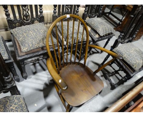     An Ercol Spindle Backed Elbow Chair                                             